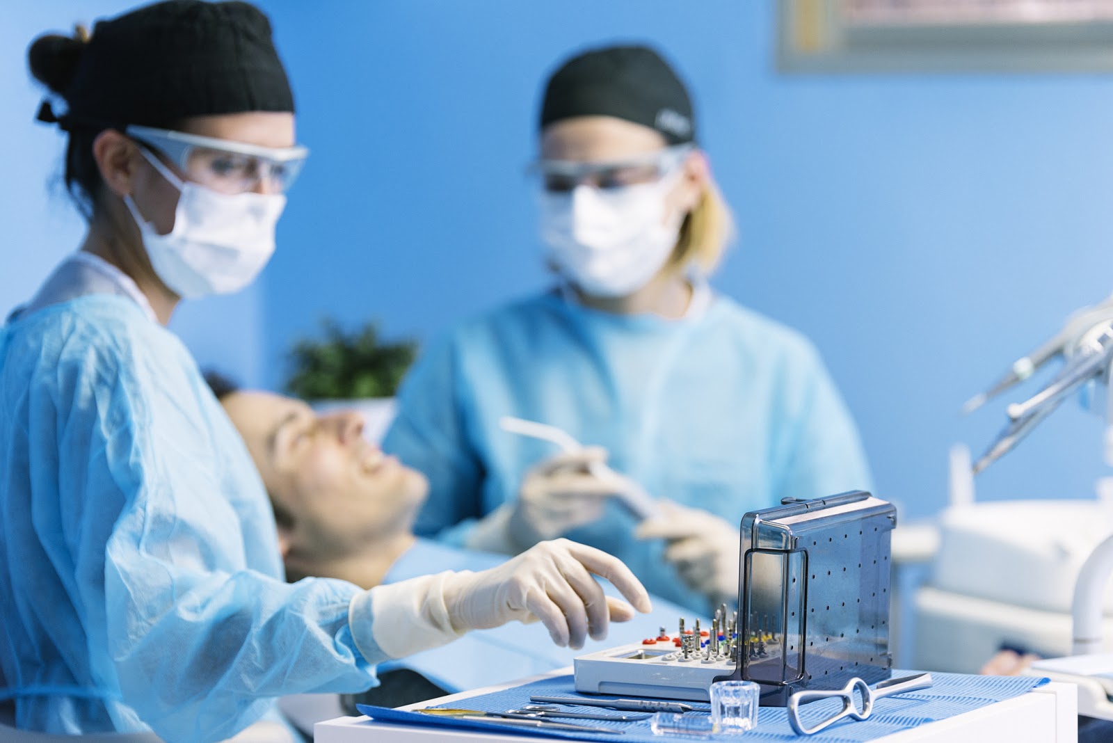 Dentists With A Patient During A Dental Intervention. Dentist Concept